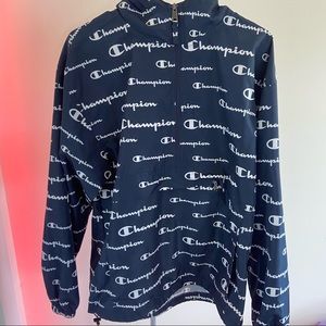 Champions men all over print hooded windbreaker Packable Half-Zip. Blue/M